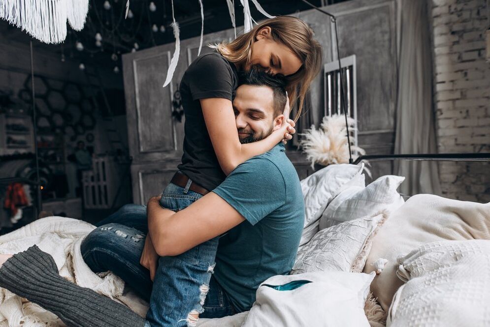 woman kissing a man who increased his power